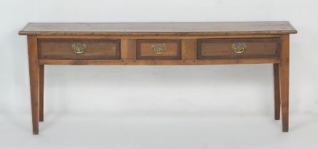 Provincial fruitwood low dresser, 19th Century, the top crossbanded with mahogany and with three