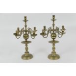 Pair of Dutch brass candlesticks, each with five sconces over multi-knopped columns with drip