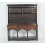 Early George III oak dresser and plate rack, possibly Montgomeryshire, circa 1760, the boarded