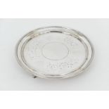 George III silver teapot stand, maker W.T, London 1783, foliate engraved decoration, raised on