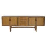 G-Plan Fresco teak long sideboard, centred with four drawers with two cupboard doors at either side,