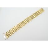 18ct gold textured leaf mosaic bracelet, width 20mm, length 19cm, weight approx. 41.6g (Please