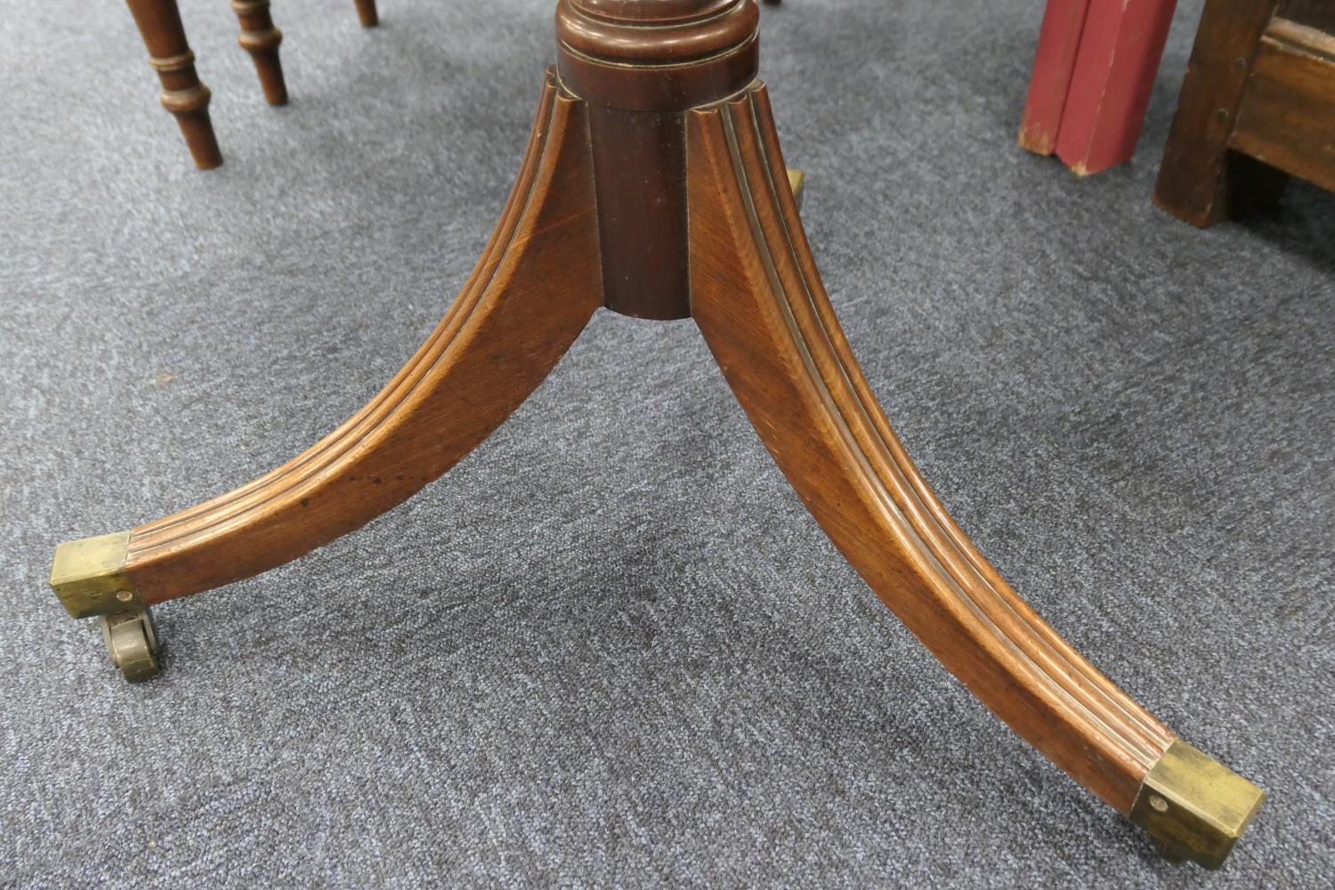 George III mahogany dumb waiter, pedestal form with two circular moulded edge shelves, on a turned - Image 6 of 7