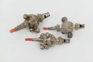 Three Victorian baby's silver rattles, comprising a whistle example with seven crotal bells and