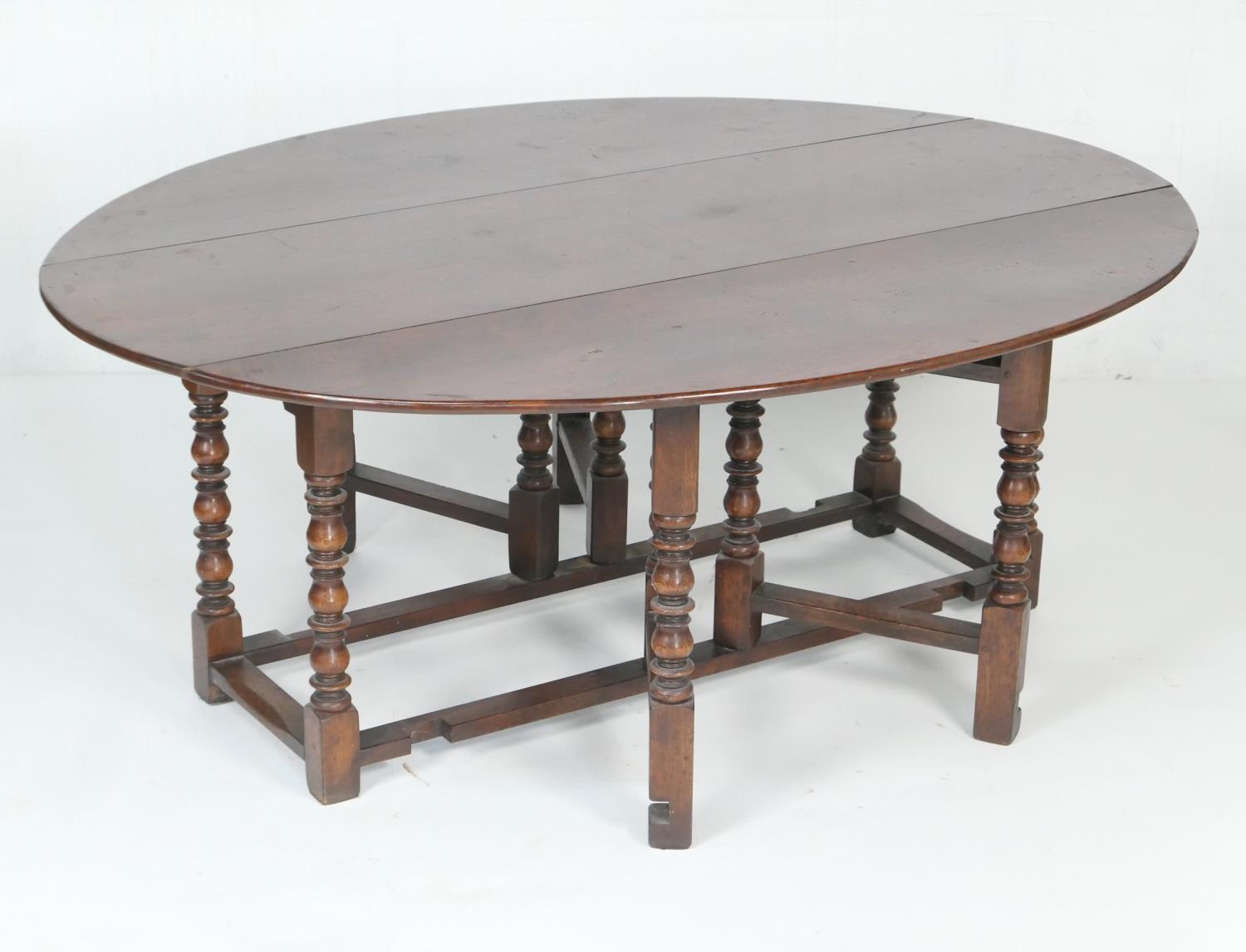 Quality large oak gateleg table in 18th Century style, the oval top with drop leaves supported on - Image 3 of 3