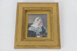 Late 19th Century portrait miniature on ivory featuring a young woman in a lace veil, 11cm x 9cm (