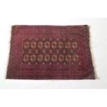 Tekke Bokhara madder ground woollen rug, with two rows of guls and multi guard stripe border, size