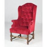 William & Mary style upholstered red fabric upholstered wing armchair, early 20th Century, with