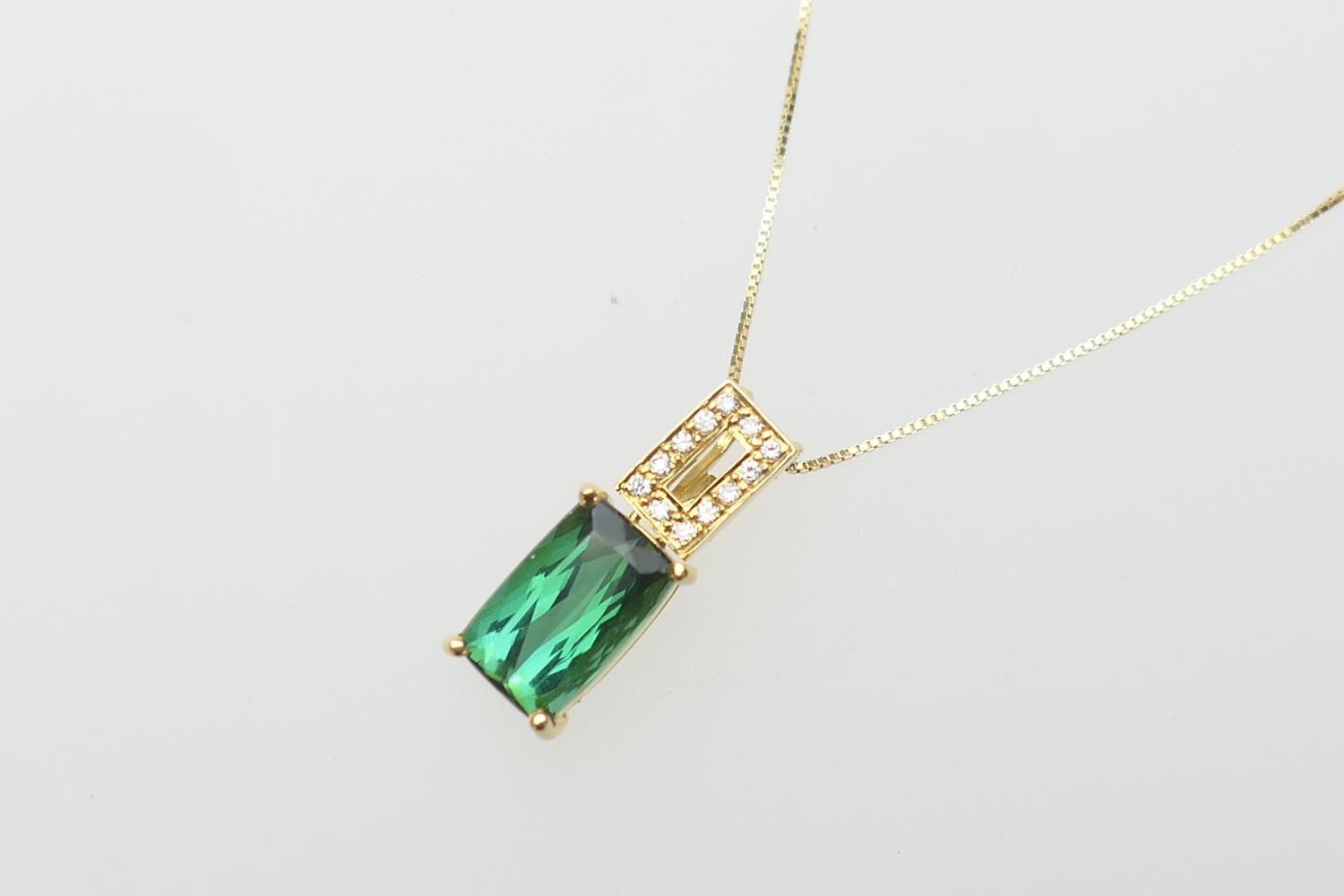 Tourmaline and diamond pendant necklace, in 18ct gold, rectangular cut green stone approx. 9mm x