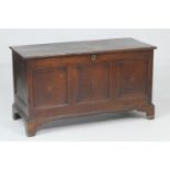 George III oak and inlaid linen box, circa 1790, three plank top over a three recessed panel front