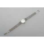 Omega 9ct white gold lady's bracelet wristwatch, circa late 1960s, 13mm silvered dial with baton
