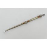 Torah pointer, traditional form worked with white metal details and orange cabochons set onto