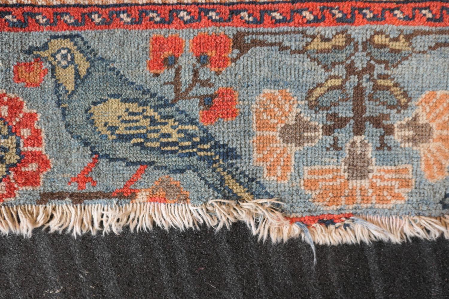 Persian Malayer woollen rug, late 19th Century, centred with a red flowerhead motif within a fawn - Image 3 of 9