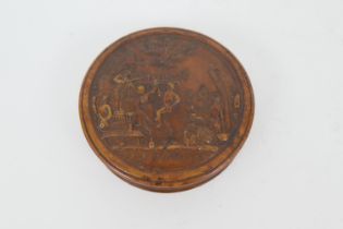 Pressed burr wood circular snuff box, 19th Century, the cover decorated with a scene of revellers,