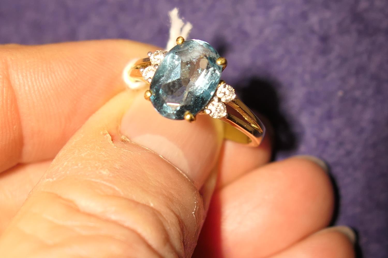 Diamond and blue zircon dress ring, the central oval cut stone of approx. 3cts, bordered with four - Image 7 of 7