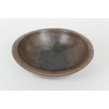 Treen dairy or grain bowl, the edge with simplistic carved chevron decoration, 38.5cm diameter (