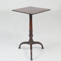 Regency goncalo alves tripod table, rectangular top over a slender turned and ringed column,