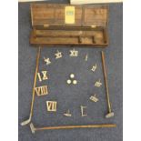 Clock golf set, boxed, with cast iron Roman numerals, three aluminium headed adapted hickory shafted