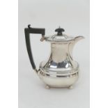 George VI silver hot water jug, by Mappin & Webb, Birmingham 1942, baluster form with gadrooned