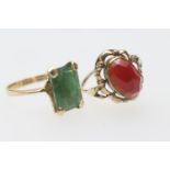 Emerald dress ring, the stone of approx. 12mm x 8mm, in a four claw mount on an unmarked yellow gold
