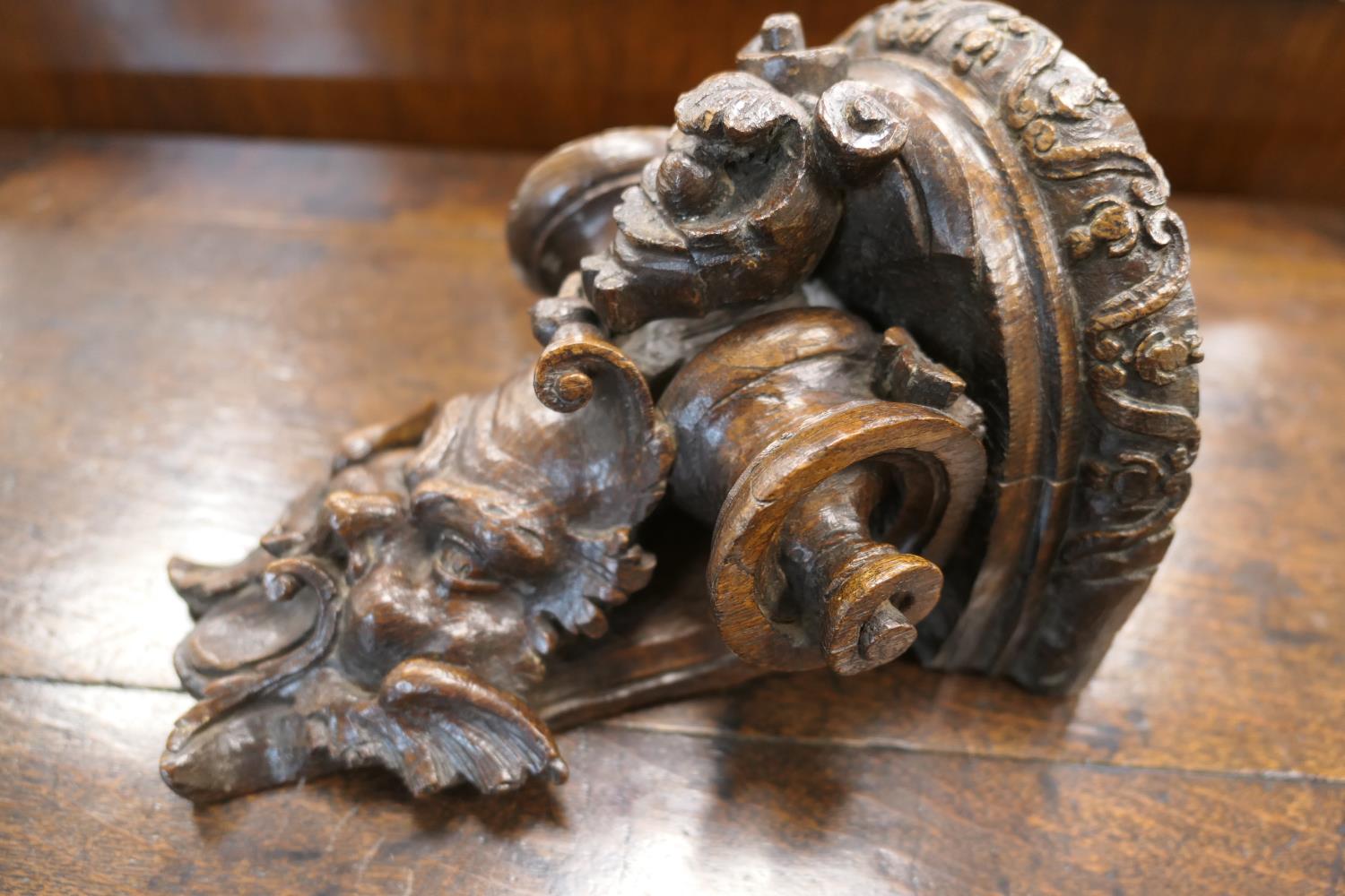 Late 17th Century carved oak bracket, carved with a grotesque mask and paper scroll, 22cm x 16. - Image 5 of 7