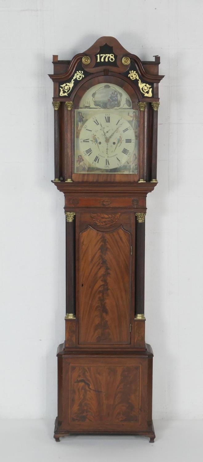James Lomax, Blackburn, a mahogany and inlaid eight day longcase clock, the hood with verre eglomise