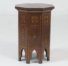 Moorish octagonal parquetry table, circa 1900, inlaid throughout with mother of pearl and wood