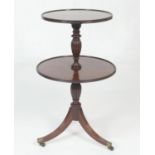 George III mahogany dumb waiter, pedestal form with two circular moulded edge shelves, on a turned