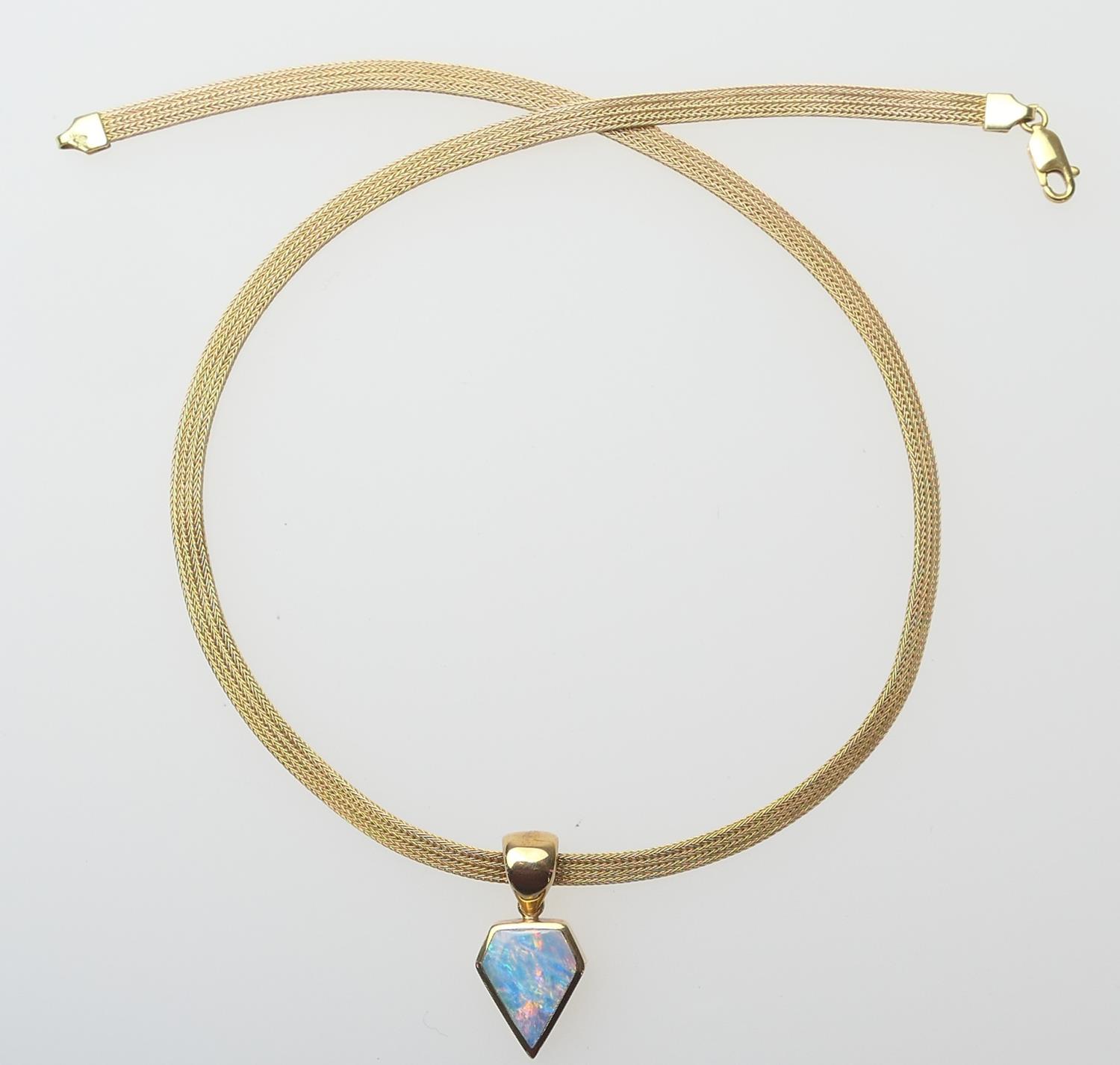 Opal pendant necklace in 9ct gold, the opal set within a pentagon mount, with loop for suspension,