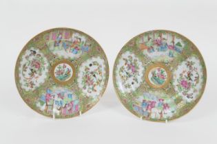 Pair of Cantonese famille rose saucer dishes, late 19th Century, decorated in typical palette, 20.