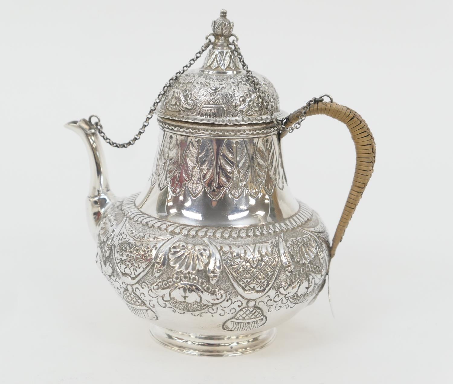 Edwardian silver teapot, by Daniel and John Wellby, London 1905, in 17th Century style, baluster