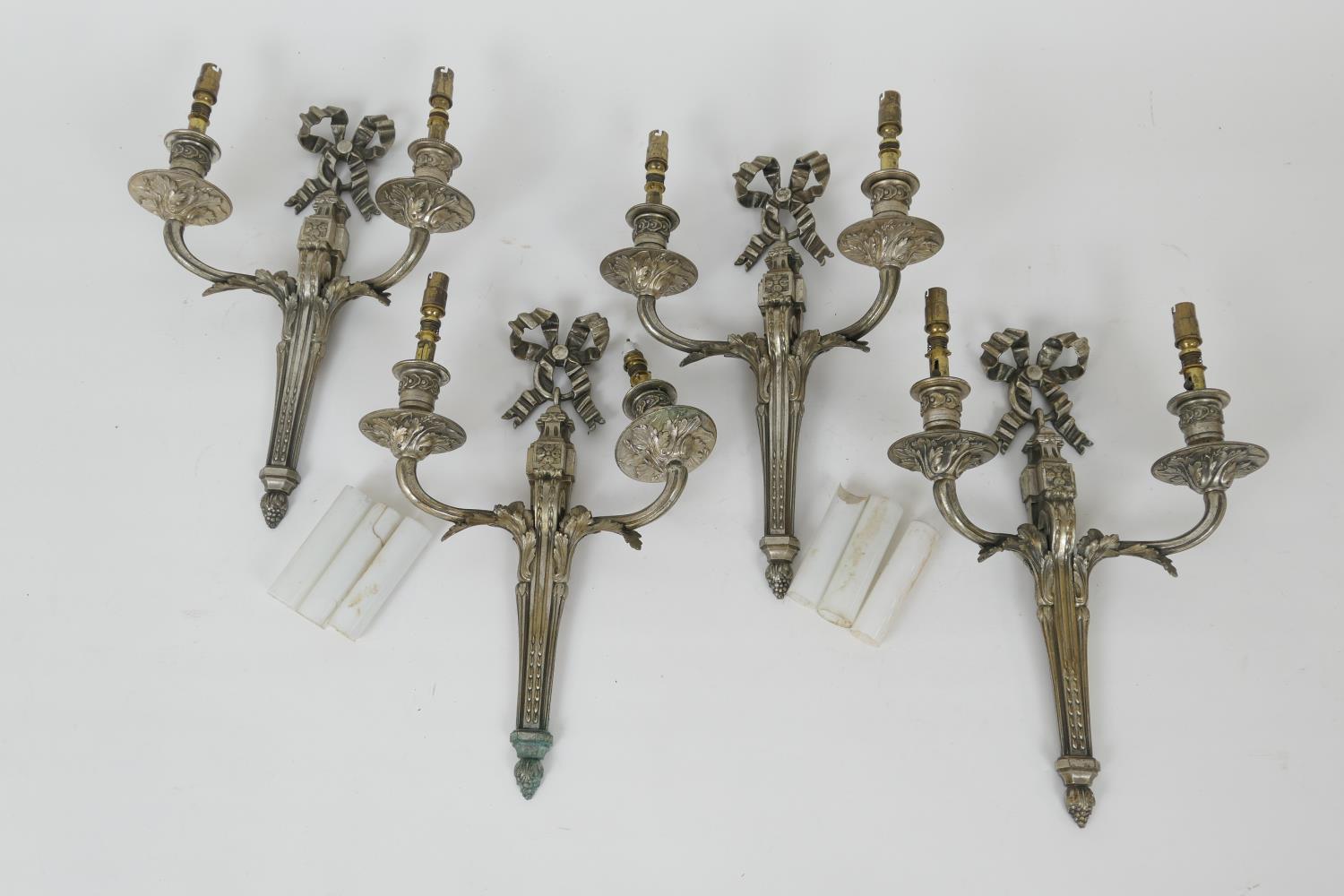 Set of four French silver plated and ormolu twin branch wall lights, late 19th Century, 40cm x