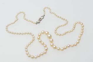 Cultured pearl choker necklace, the graduated pearls united by a 9ct white gold clasp centred with a