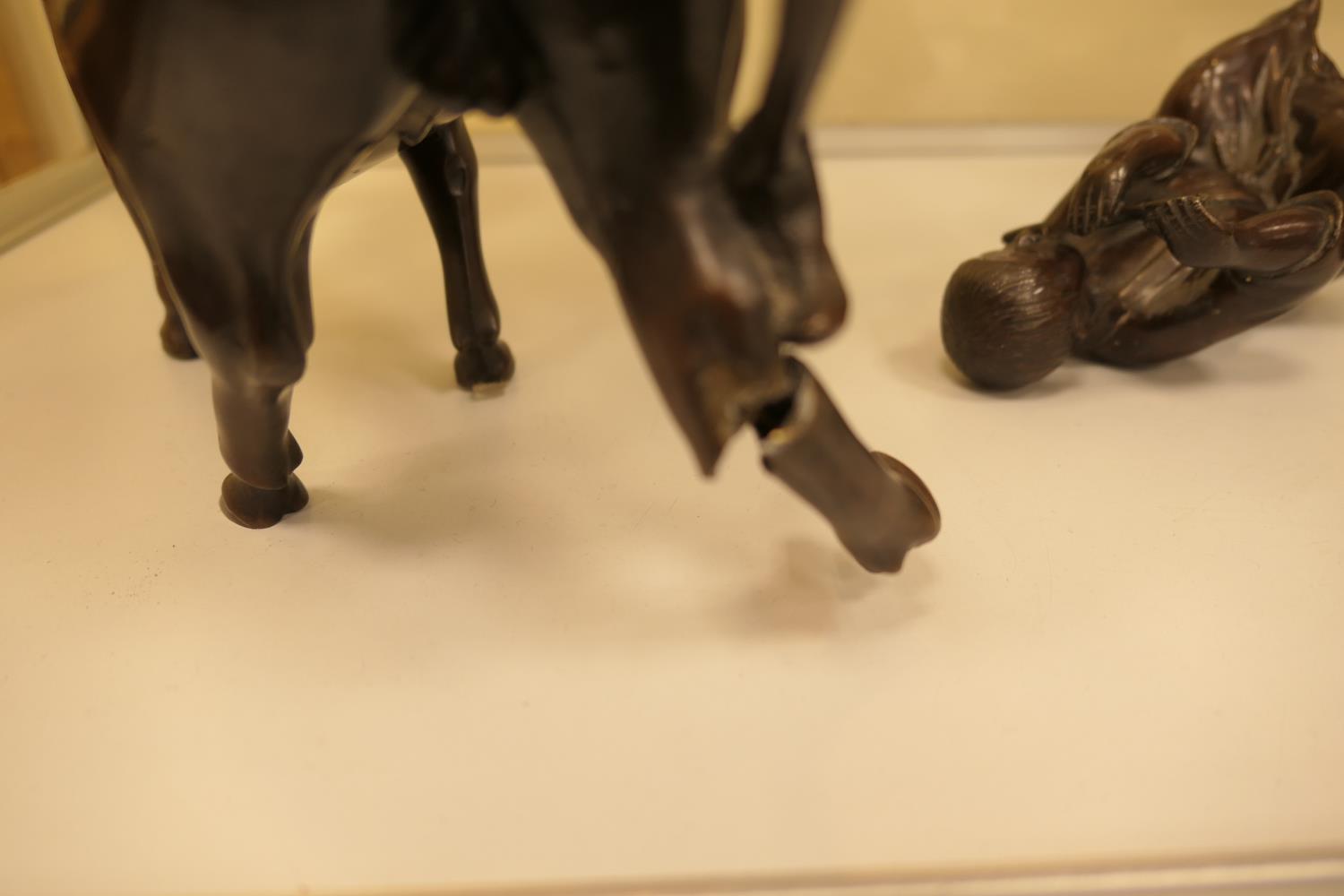 Chinese bronze incense burner, modelled as a boy riding a bull whilst playing a flute, circa 1900 ( - Image 3 of 6