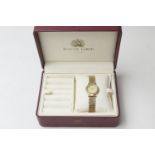 Bueche Girod 9ct gold lady's quartz wristwatch, champagne coloured dial with baton numerals, the