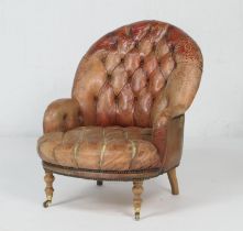 Victorian style brown deep buttoned leather upholstered armchair, with rounded back and bowed seat