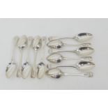 Eleven silver fiddle pattern table spoons, comprising seven George III by William Eley and William