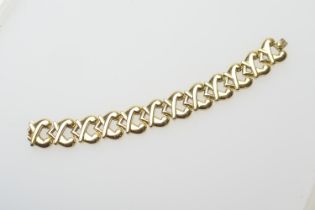Boodles 18ct yellow gold bracelet, formed as conjoined hearts, signed, length 18cm, weight approx.