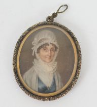 English School (Circa 1830), Portrait miniature of a lady in a white lace bonnet and ruff collar,