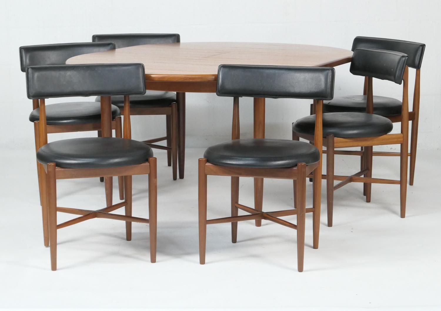 G-Plan teak Fresco extending dining table and chairs, the circular table 122cm diameter, extending