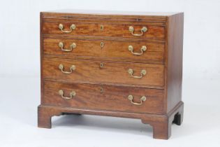 George III mahogany bachelor’s chest, having a brushing slide over four graduating long drawers with