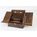 Victorian walnut stationery box, hinged top and slope front opening to reveal a comparted interior