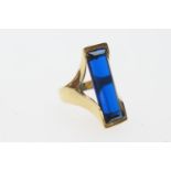 Continental 18ct gold synthetic sapphire dress ring, long rectangular cut stone in a modernist