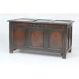 Charles II oak joined coffer, dated 1662, the three recessed panel top over a front carved with '