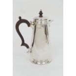 Elizabeth II silver hot water jug, maker R C, London 1979, hinged cover with turned wooden finial