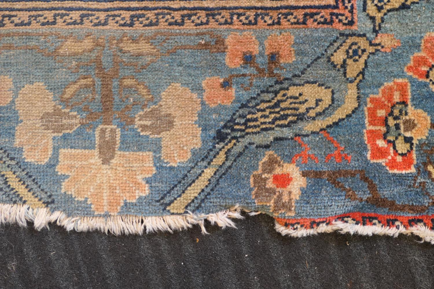 Persian Malayer woollen rug, late 19th Century, centred with a red flowerhead motif within a fawn - Image 7 of 9