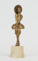 In the style of Josef Lorenzl, an Art Deco cold painted bronze figure of a girl holding an ostrich