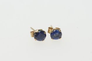 Pair of sapphire ear studs, the oval cut stones of approx. 0.5ct, mounted in 9ct yellow gold,