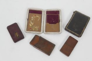 Number of calling card cases, including a leather and metal framed case, circa 1880, with silk