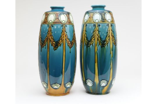 Matched pair of Minton Secessionist vases, circa 1900, each of ovoid form decorated with stylised